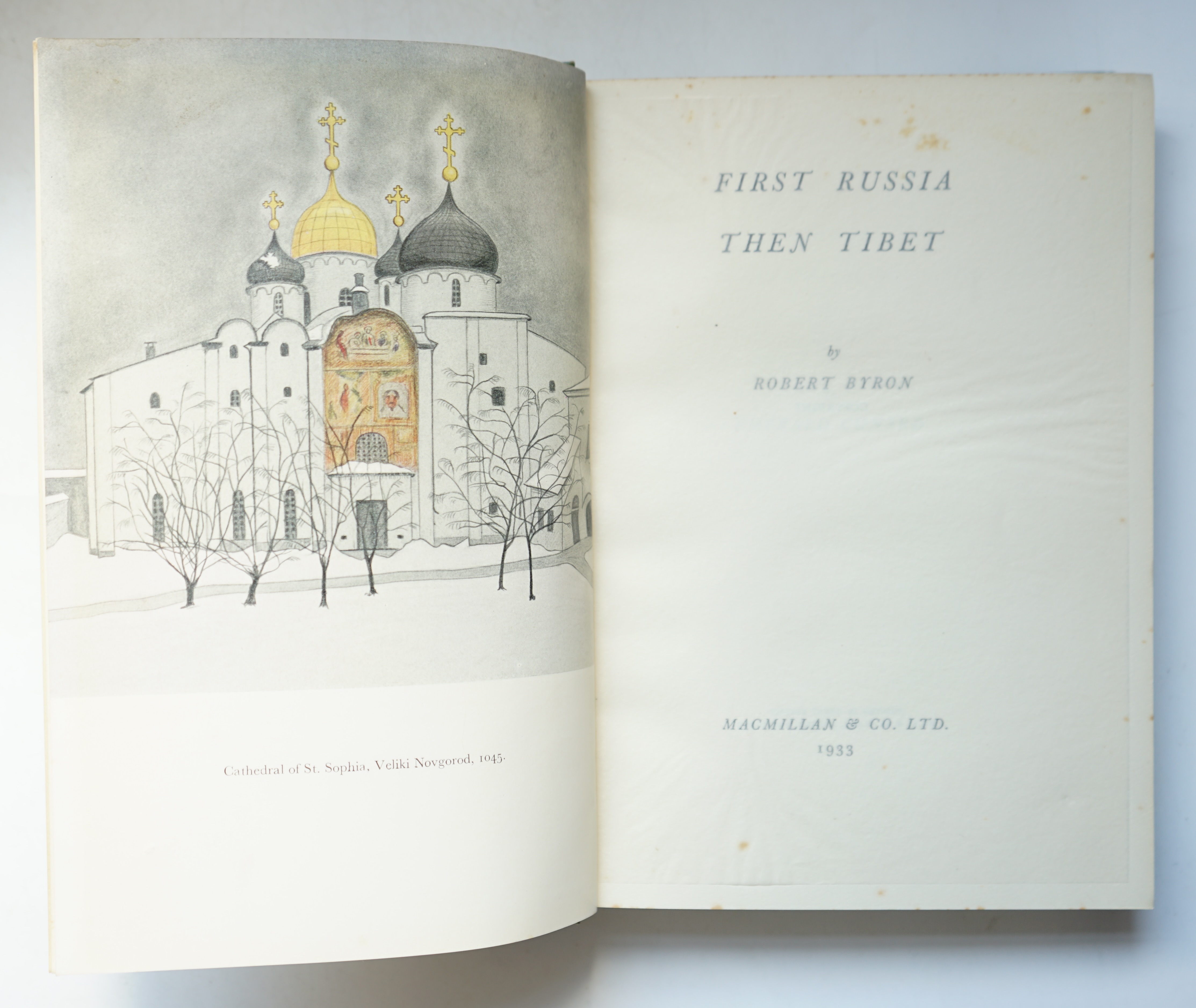 Byron, Robert - First Russia Then Tibet, 8vo, original green cloth, colour frontispiece and black and white plates, Macmillan & Co. Ltd, London, 1933